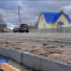 В селе Корткерос продолжается капитальный ремонт центральной дороги и тротуаров